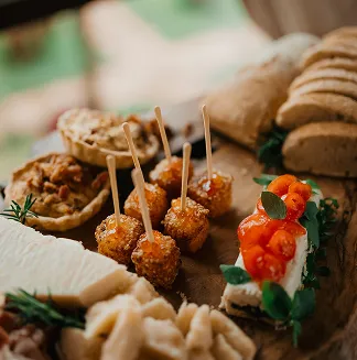Assorted appetizers arranged on a catering platter.