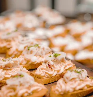 Savory canapés arranged on a serving platter.